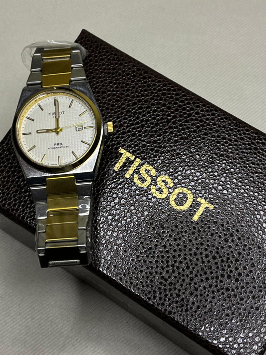 Elegant Tissot: Gold & Silver Stainless Steel Watch