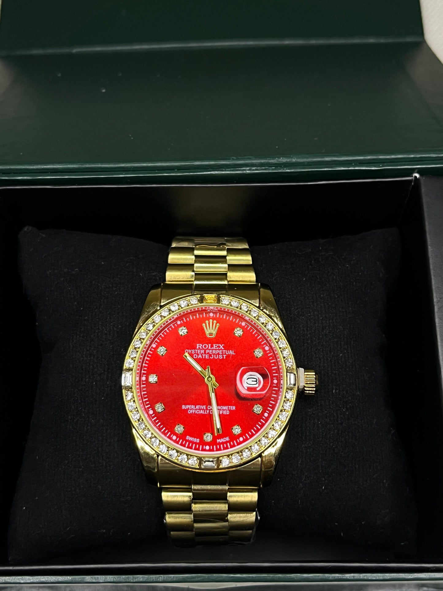 Gold Rolex with Red Dial & Diamonds